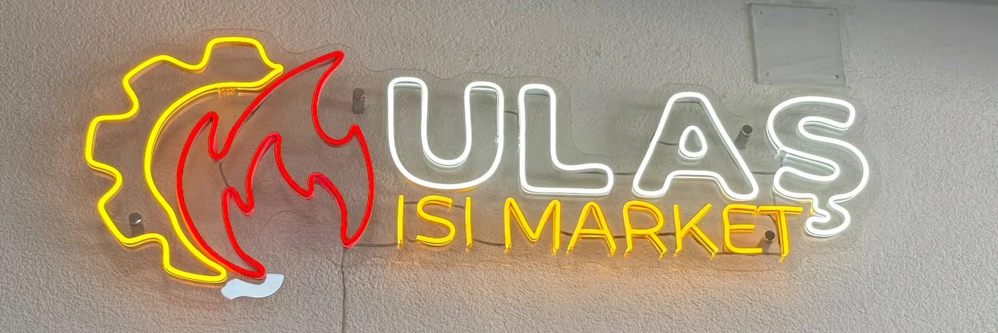 Ulaş Isı Market mağaza tabelası